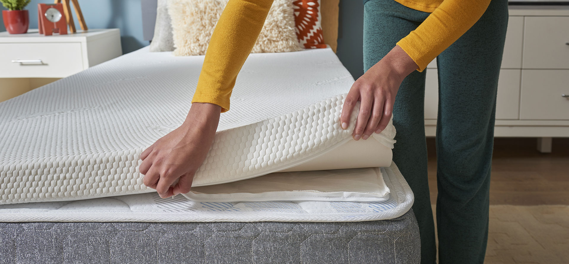 Cooling mattress pad with woman.
