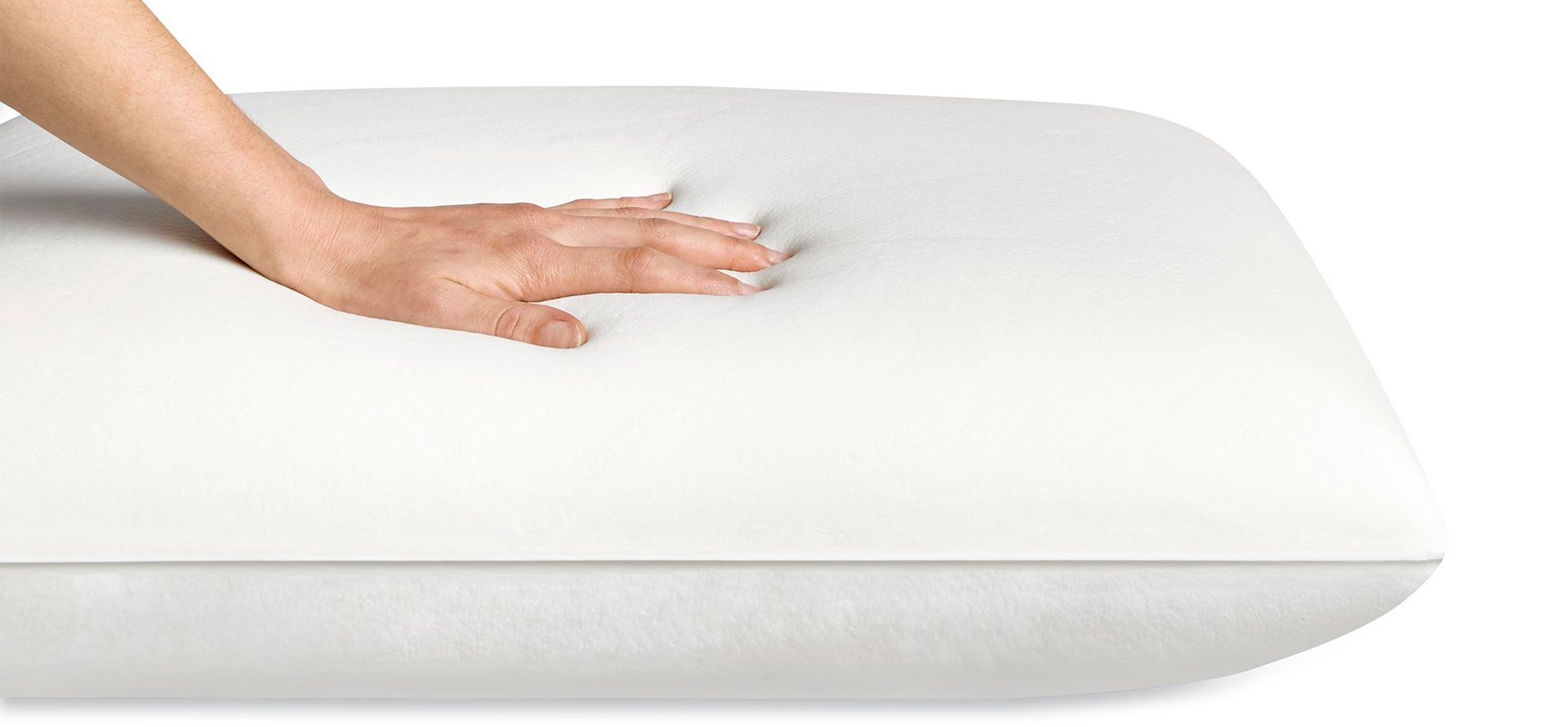 Hand on memory foam pillow.