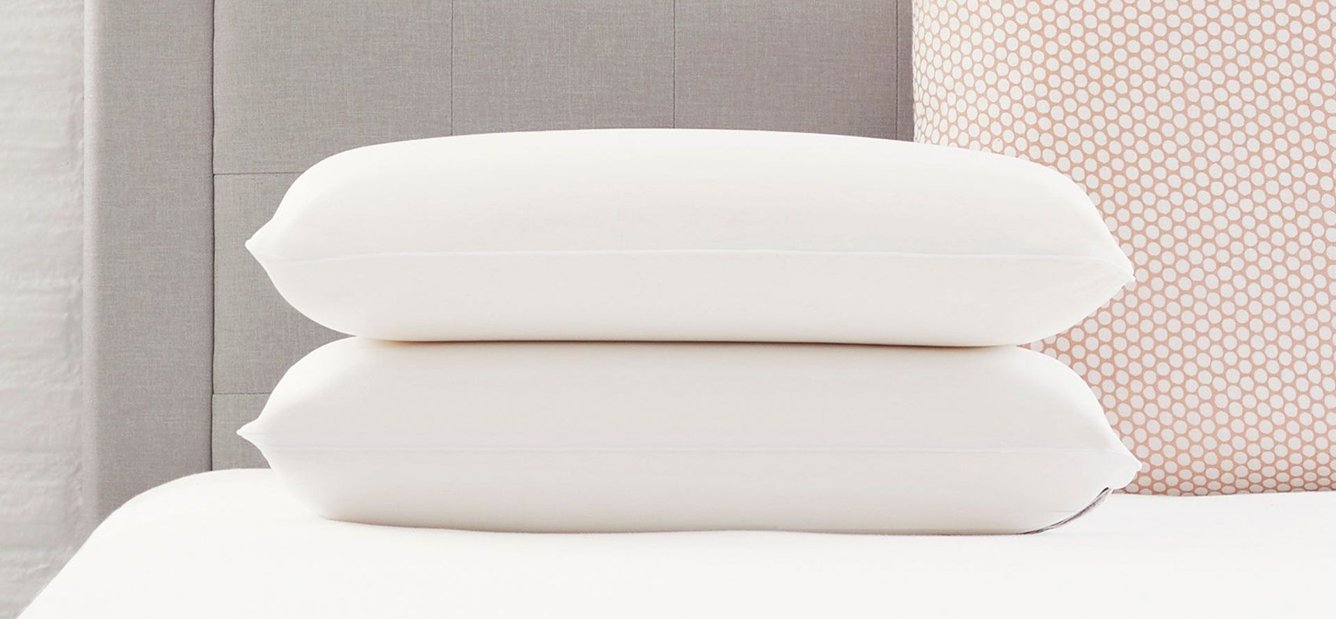Pillows on the bed mattress.